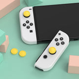 eXtremeRate PlayVital Switch Joystick Caps, Switch Lite Thumbstick Caps, Silicone Analog Cover for Switch OLED Joycon Thumb Grip Rocker Caps for Nintendo Switch & Switch Lite - Bright Yellow - NJM1192