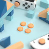 eXtremeRate PlayVital Switch Joystick Caps, Switch Lite Thumbstick Caps, Silicone Analog Cover for Switch OLED Joycon Thumb Grip Rocker Caps for Nintendo Switch & Switch Lite - Apricot Yellow - NJM1195